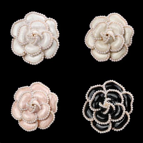 camelia pins and brooches.